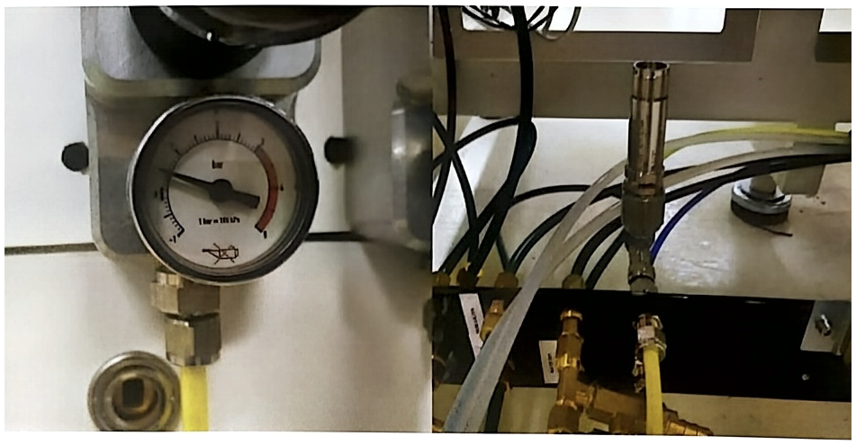 Pressure gauge set at 0.5 bar of pressure for nitrogen (left) and safety valve (right)